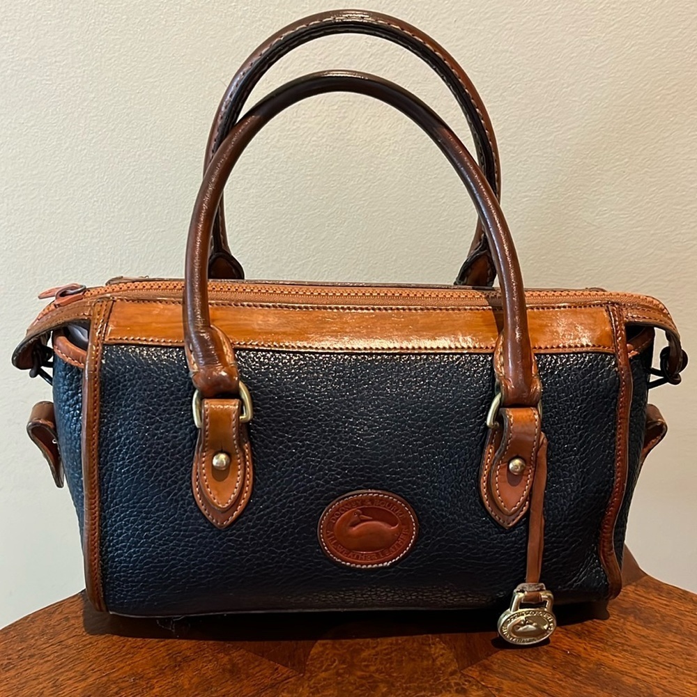 Dooney & Bourke Vintage All Weather leather Matches black or navy /brown trim